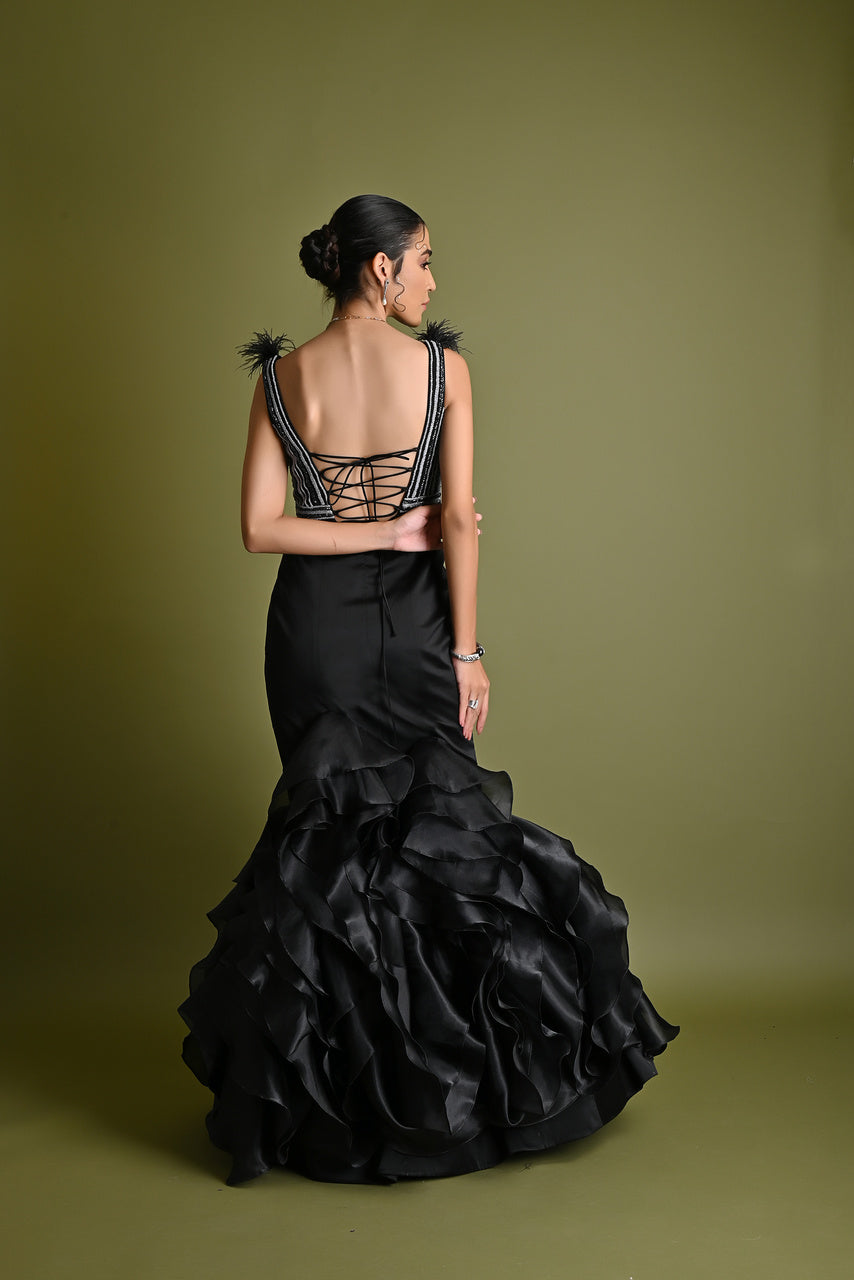Fish cut voluminous ruffle gown
