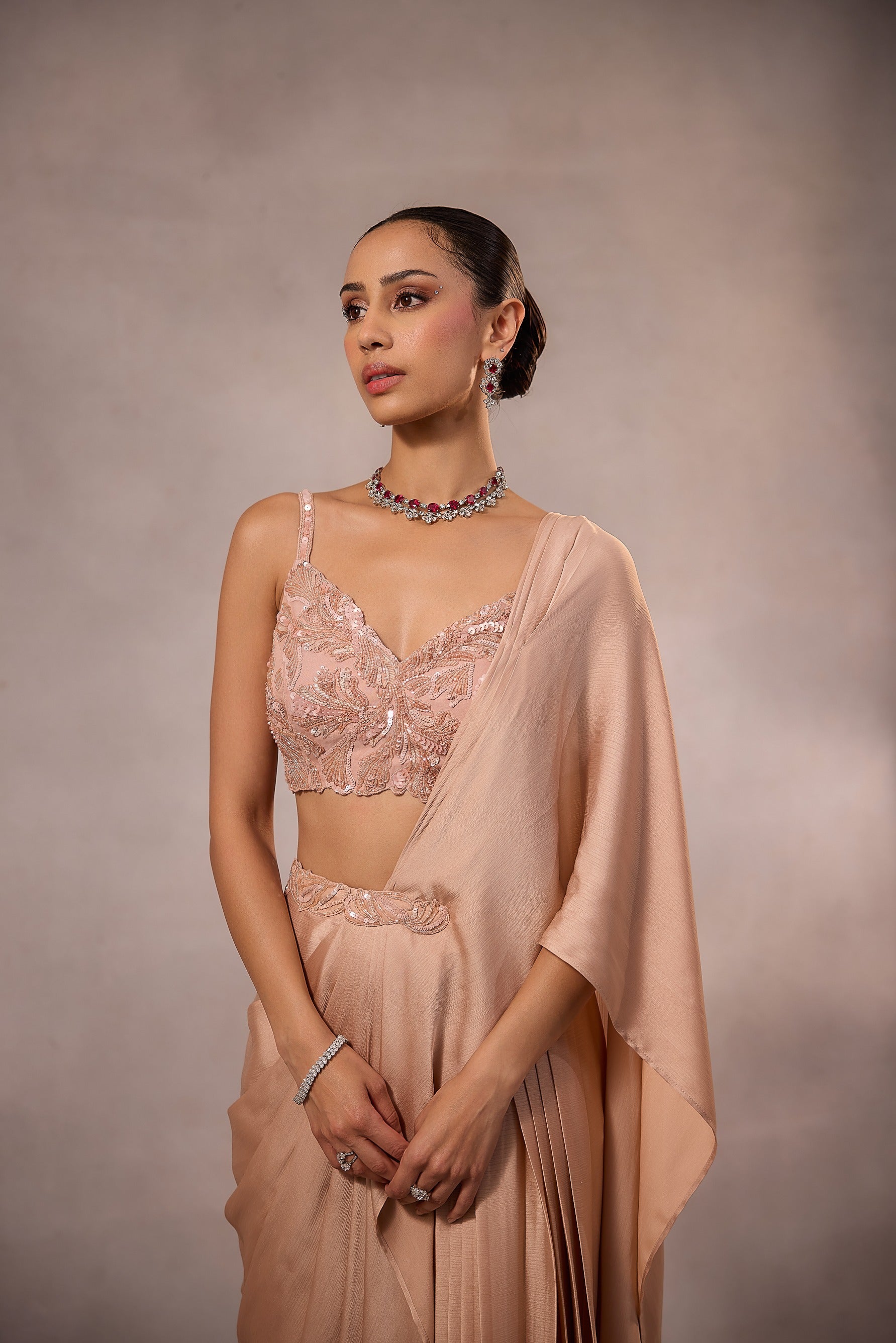 Champagne Pink  Draped Saree Set with Embellished Bustier Blouse